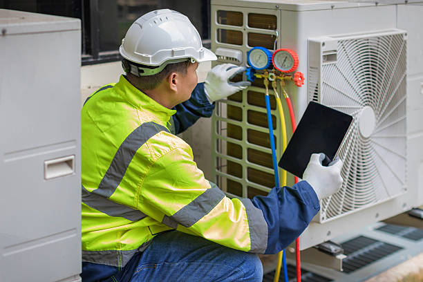 Professional Heat Pump Repair technician working in Bremen, OH